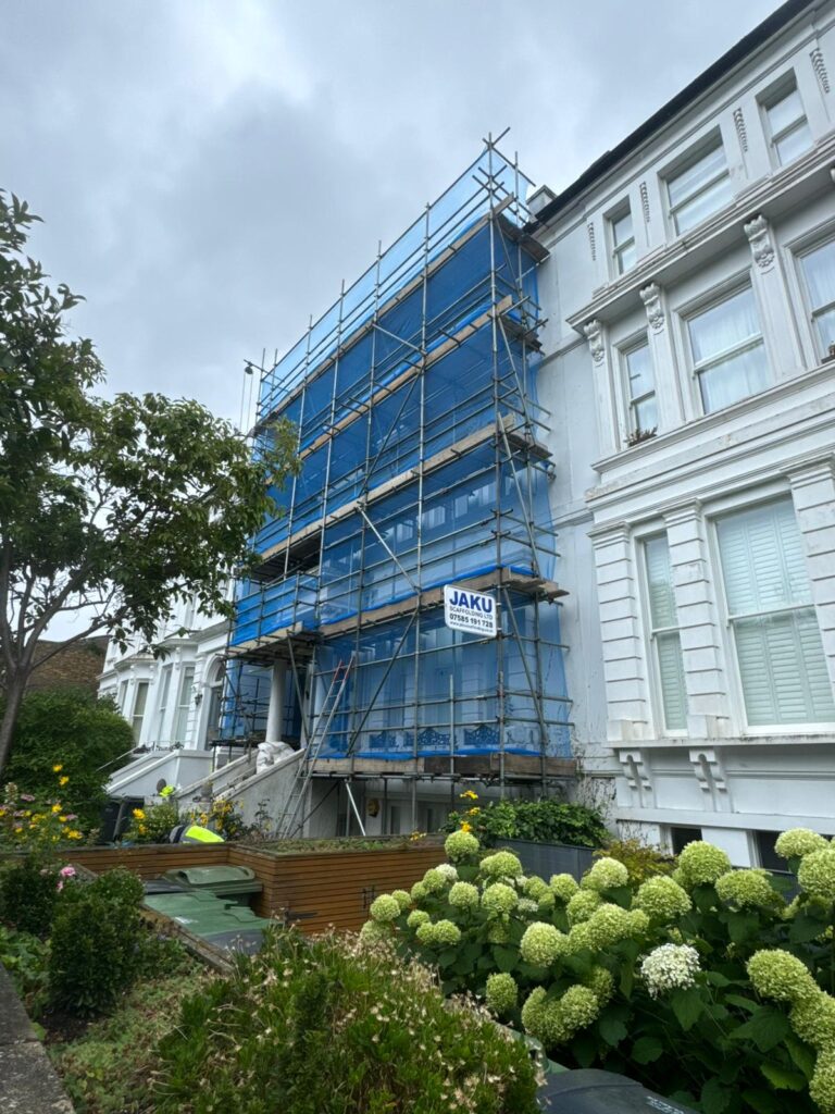 Scaffolding South Hampstead with 5 working lifts, debris netting, erected to engineer’s drawing for external decoration and roofing works.