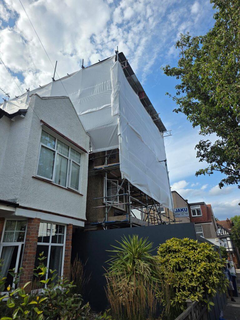 Scaffolding West London Scaffolding London project with temporary roof in Ealing providing full weather protection during property renovation.