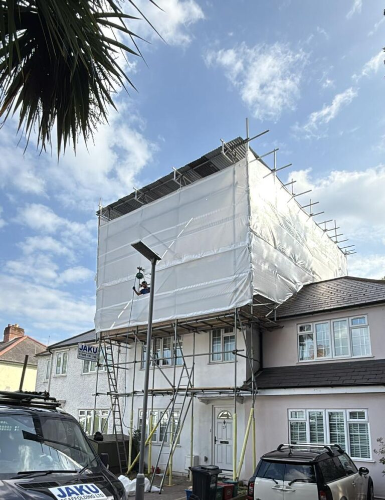 Temporary roof scaffolding at residential property in Staveley Gardens, London W4, built on private land without licence requirement.